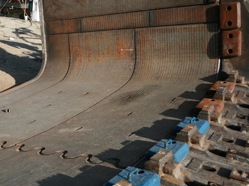 Wear plate added to a piece of equipment