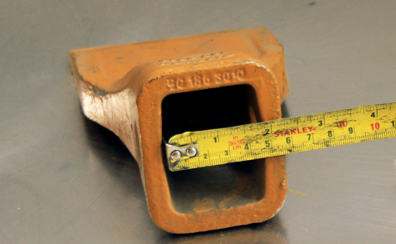 A tape measure used to measure the width of a tooth
