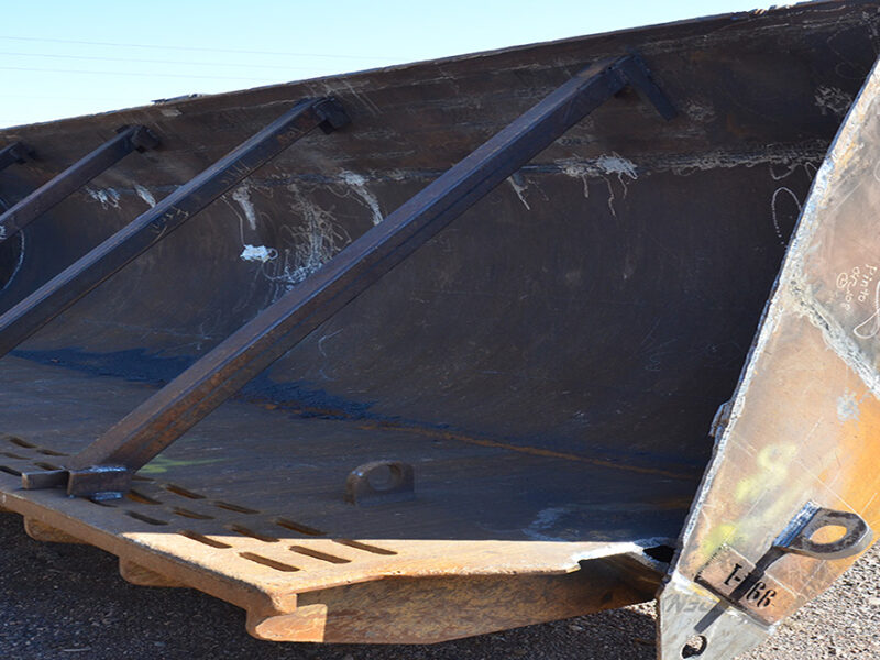 front of large bucket