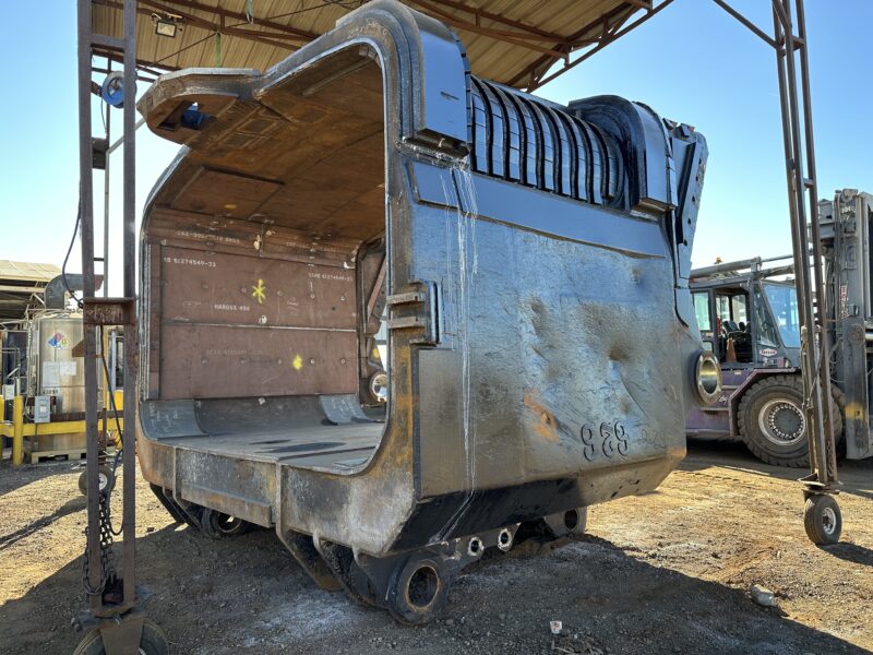 large equipment being worked on outside side view