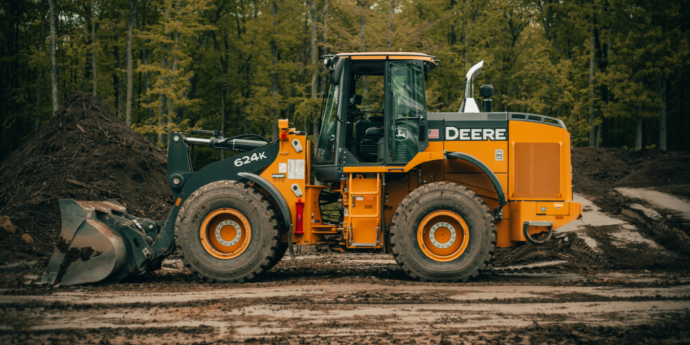 clearing land in a deere