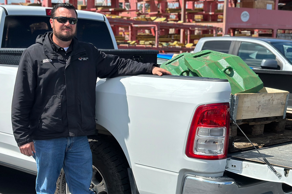 Man in front of a truck